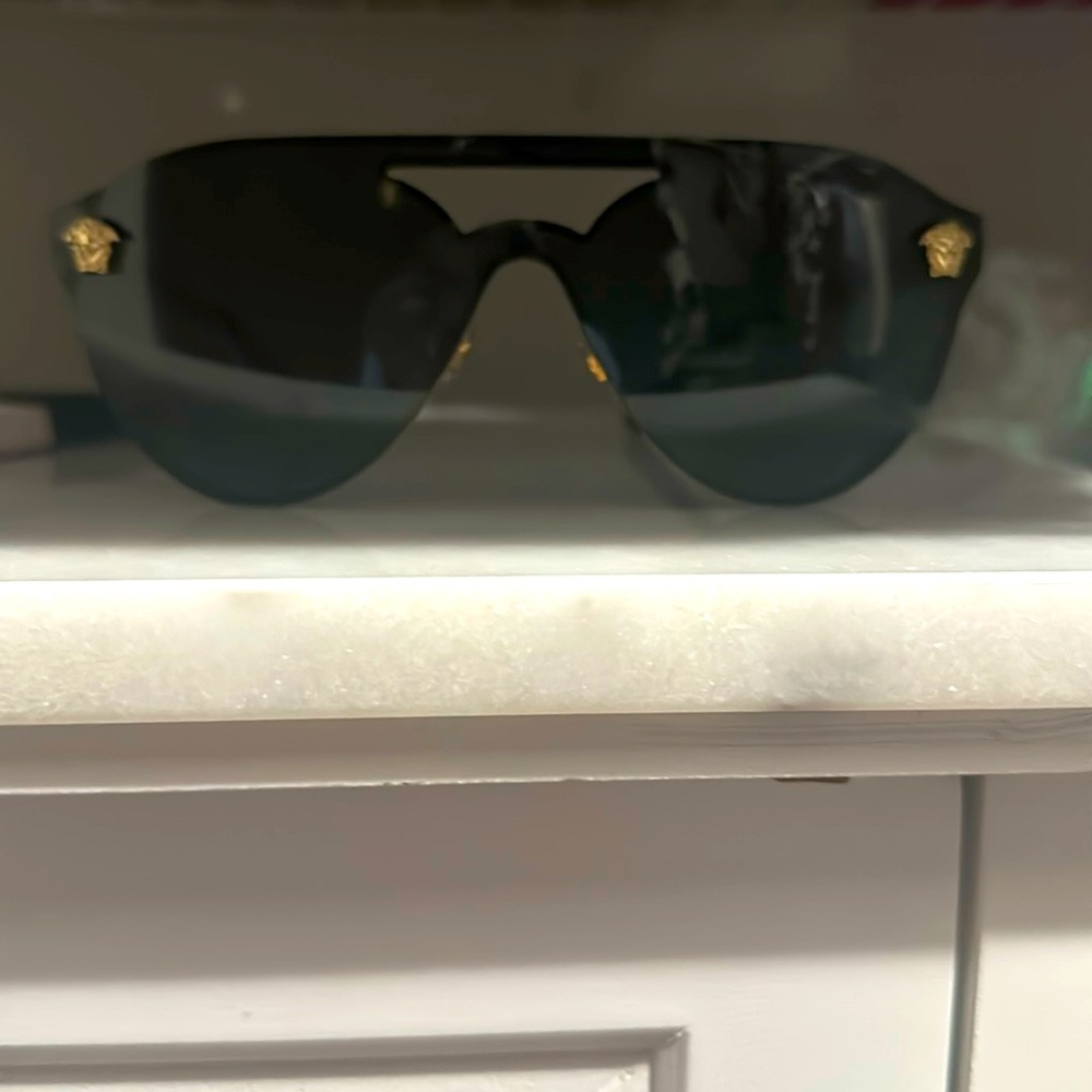 Black Versace glasses never worn in Versace case